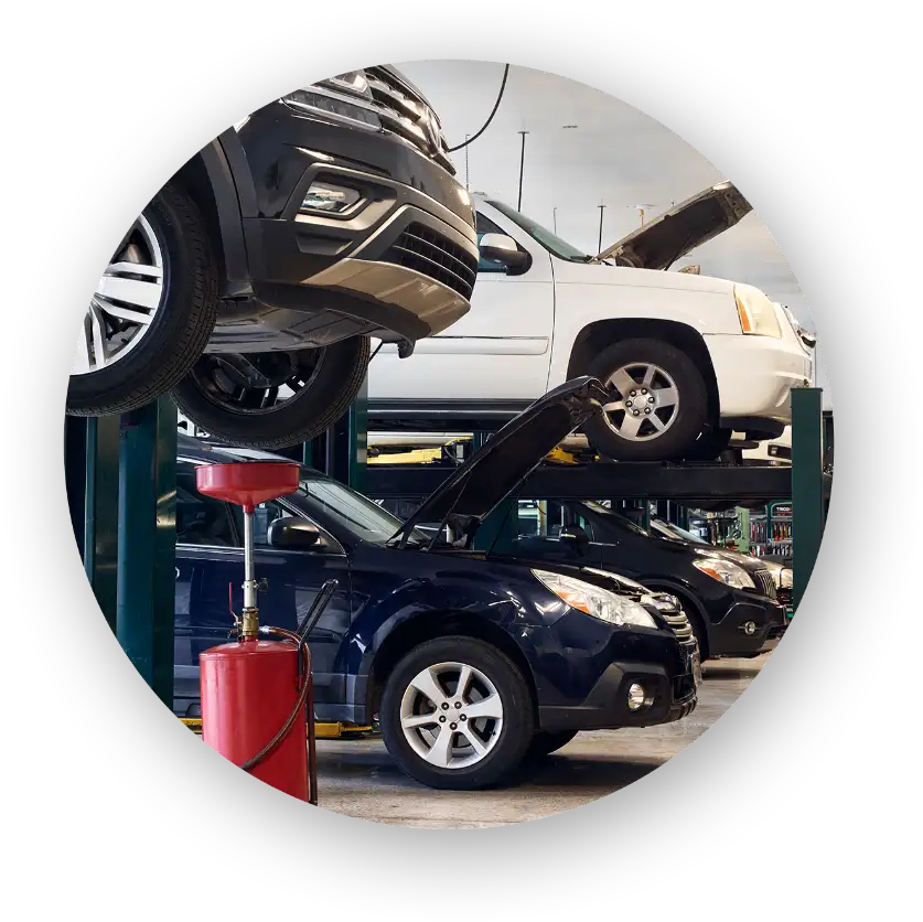 cars being serviced in a shop