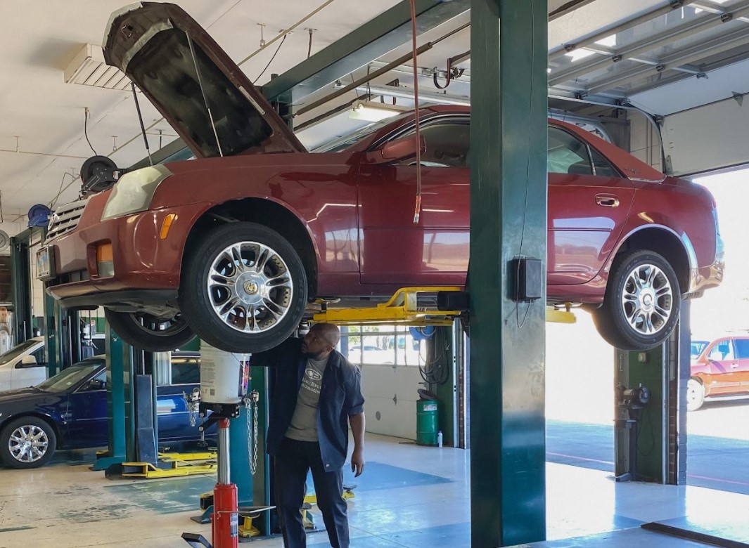 tech under vehicle