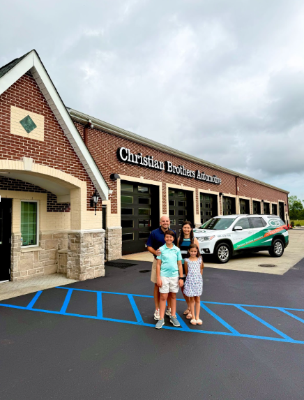 CBAC car in front of shop
