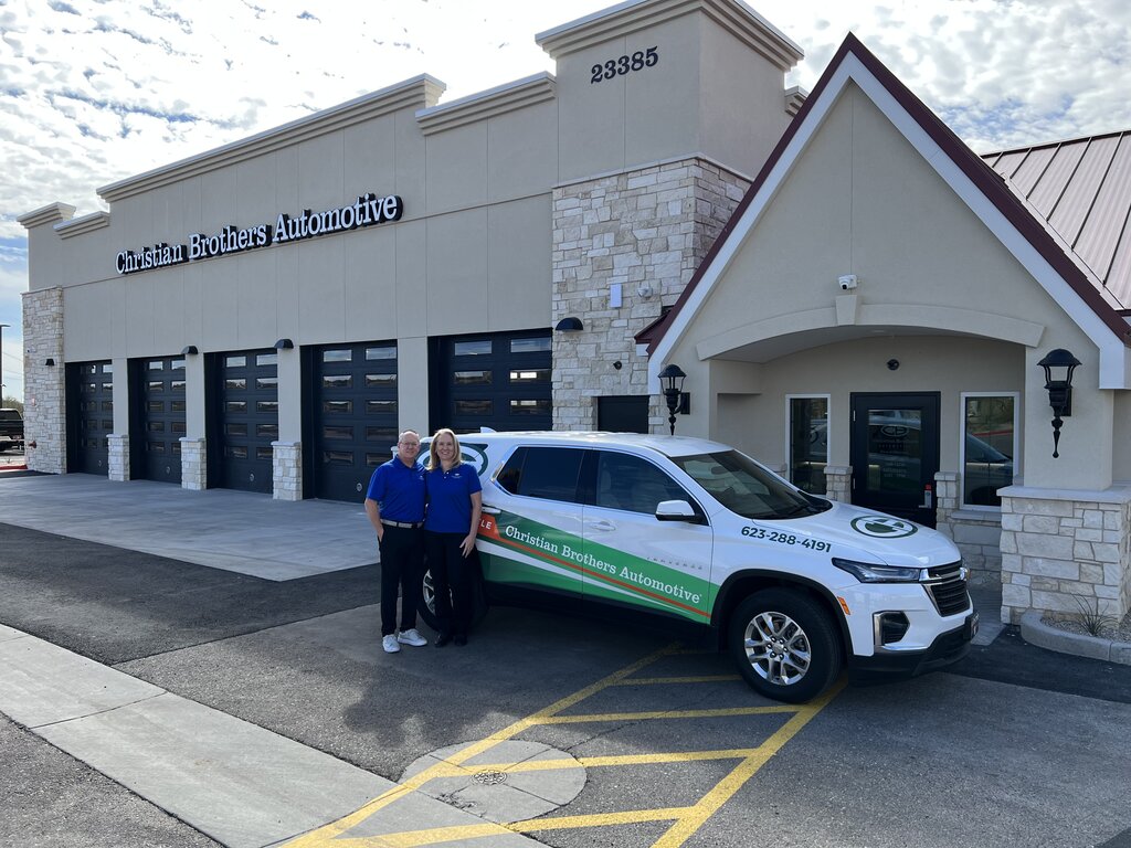 CBAC car in front of shop